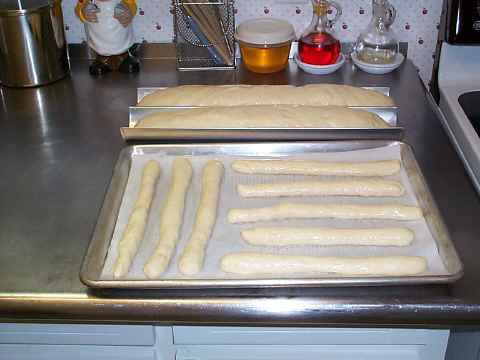 Place bread sticks on baking sheet